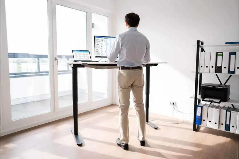 A standing desk is sometimes called a riser. They incorporate healthy standing instead of sitting.